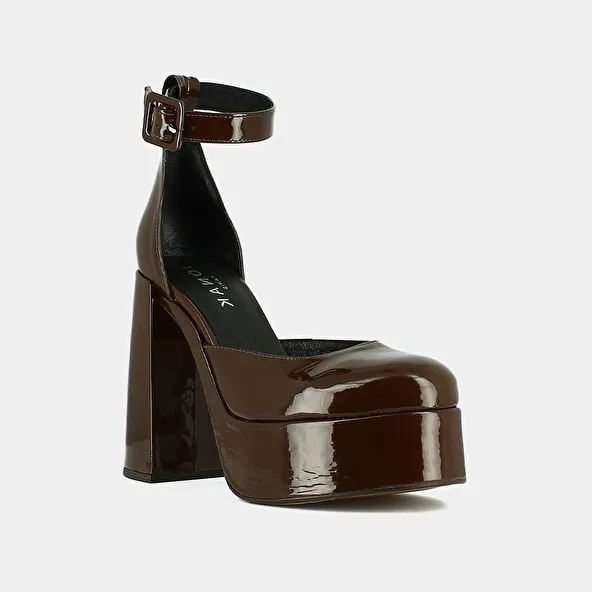 High heels and platforms in dark brown patent leather