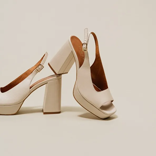 Square toe pumps with high heels in ecru aged leather